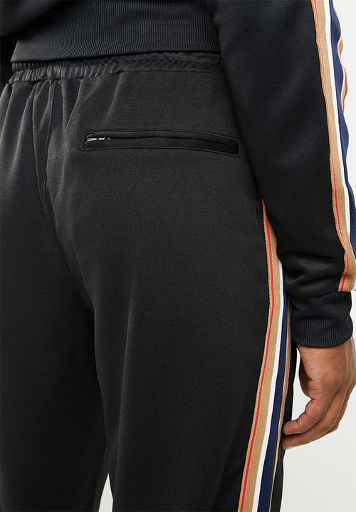 Cotton On - Slim ribbed tape tricot track jogger - black