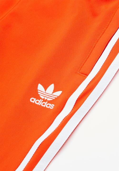 adidas Originals - Superstar track suit  - orange & white