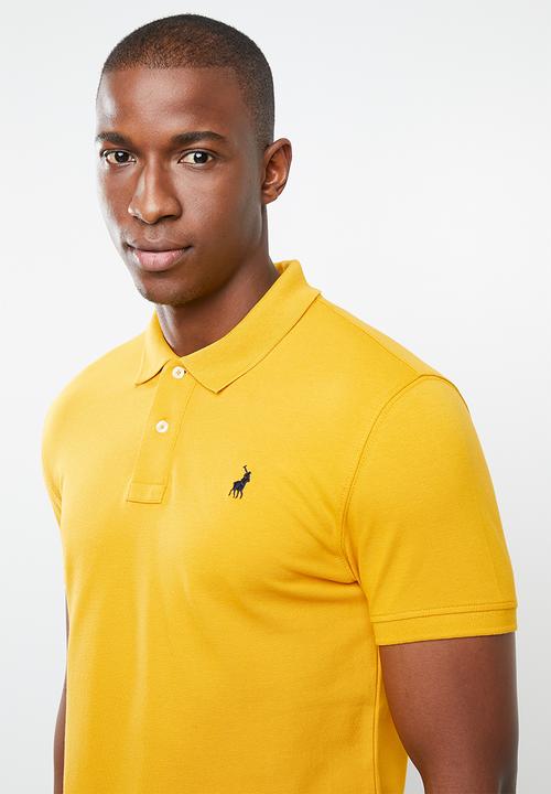 POLO - Stretch pique golfer - yellow