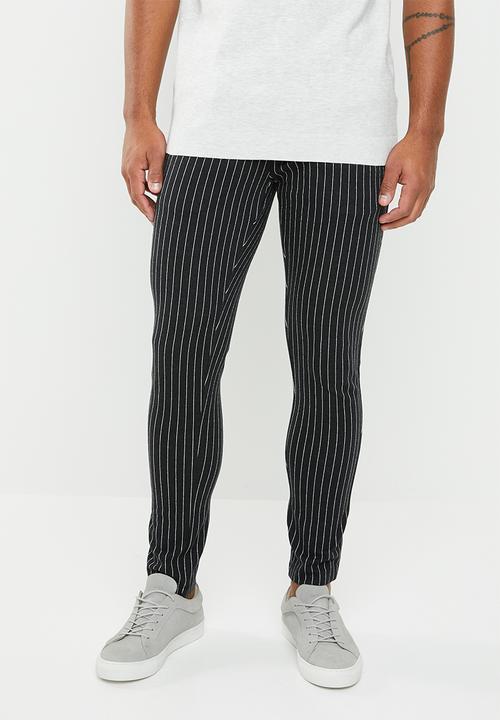 white and black pinstripe pants