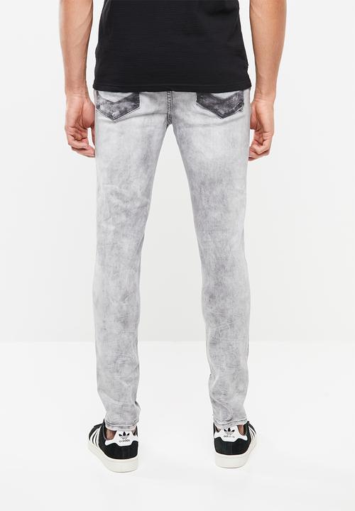 S.P.C.C - Sabre jeans in heavy bleach wash - grey