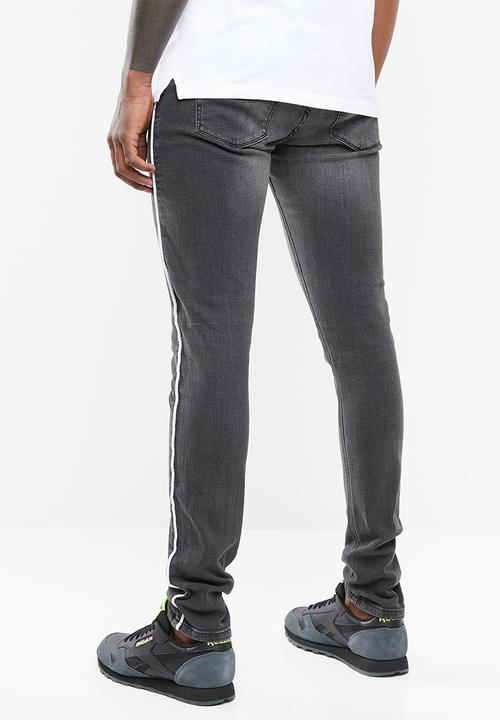 Superbalist - Skinny side stripe jeans - black