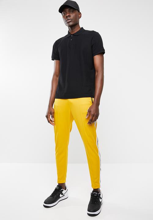 Nike - M nsw nsp track pant - yellow 