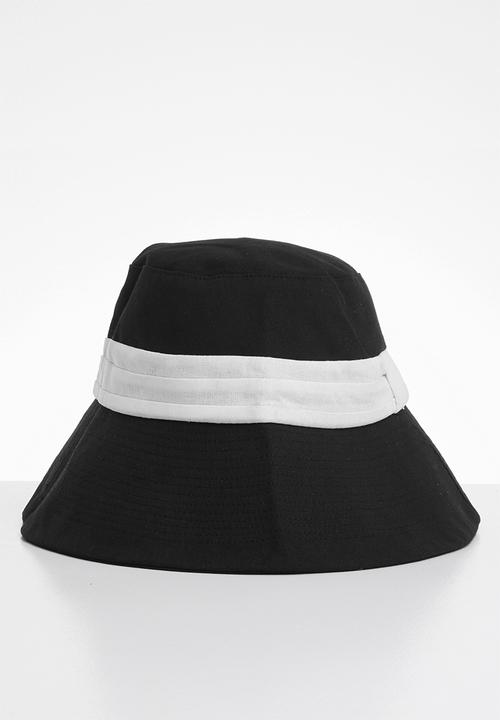 white and black bucket hat