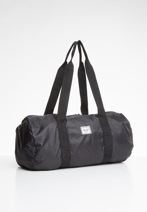 HERSCHEL - Packable duffle bag - black