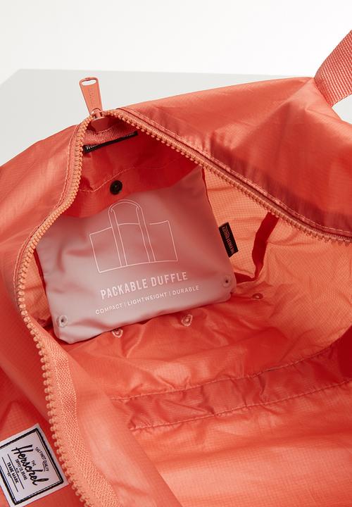 HERSCHEL - Packable duffle bag - peach
