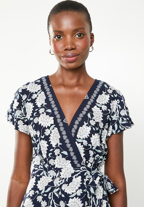 Revenge - Wrap over floral dress with contrast border - navy