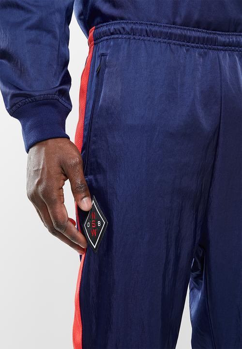Nike - Nsw nsp pant wvn - blue & red