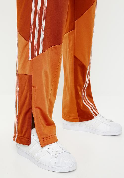 adidas Originals - Danielle cathari x adidas originals fire bird tracksuit pants - orange