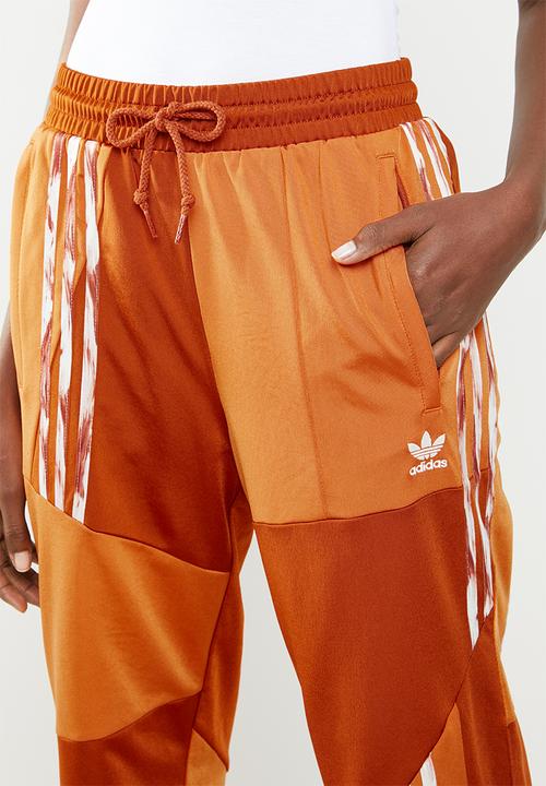 adidas Originals - Danielle cathari x adidas originals fire bird tracksuit pants - orange