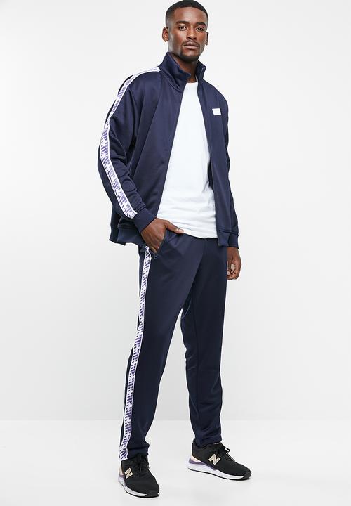 New Balance  - N pack track pant - navy