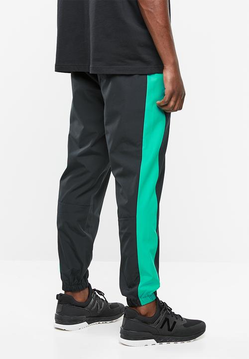 New Balance  - Archive windbreaker pant - black