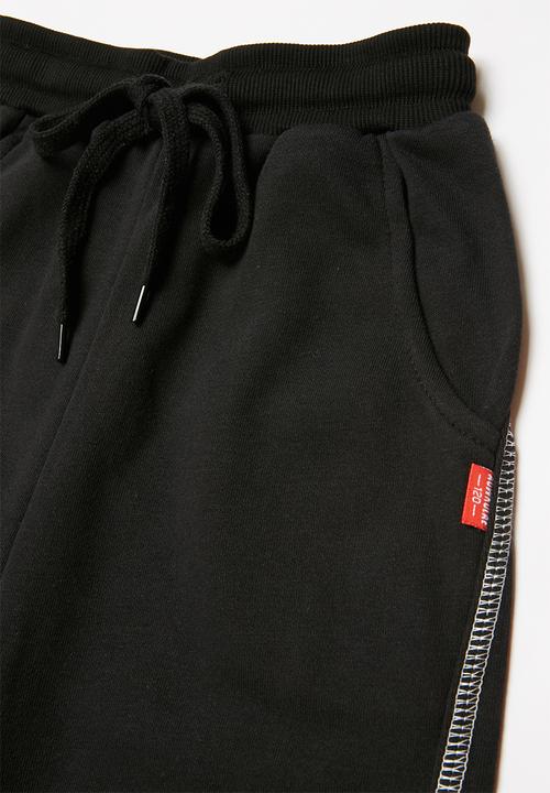 Pop Candy - Boys joggers with white stripe - black