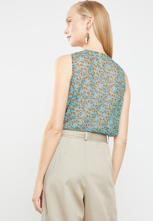 Revenge - Floral sleeveless top with front cutout - blue