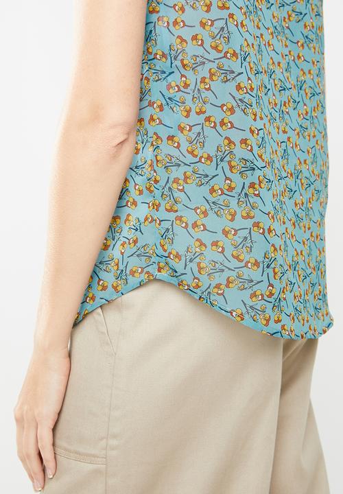 Revenge - Floral sleeveless top with front cutout - blue