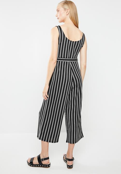 Revenge - V-front cut-out striped print jumpsuit - black & white 