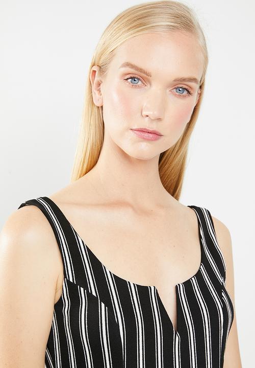 Revenge - V-front cut-out striped print jumpsuit - black & white 