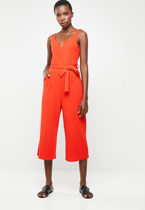 orange cut out jumpsuit