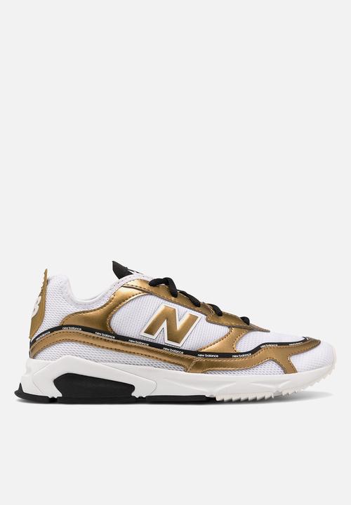 new balance sneakers gold