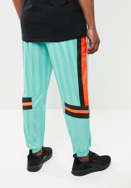 PUMA - Luxtg woven pant - multi