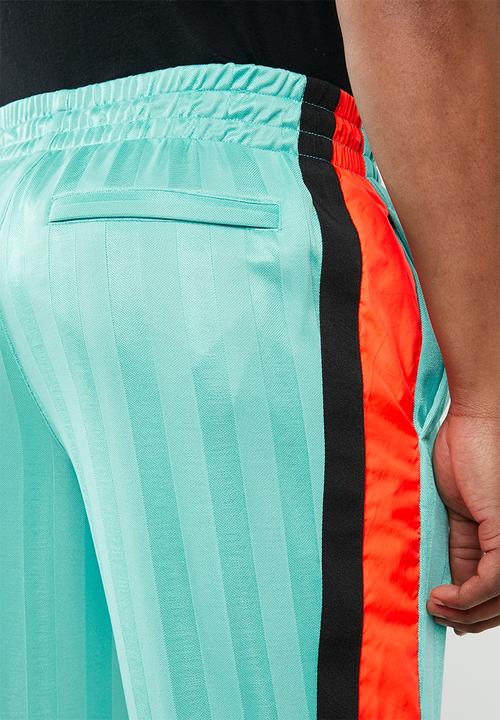PUMA - Luxtg woven pant - multi
