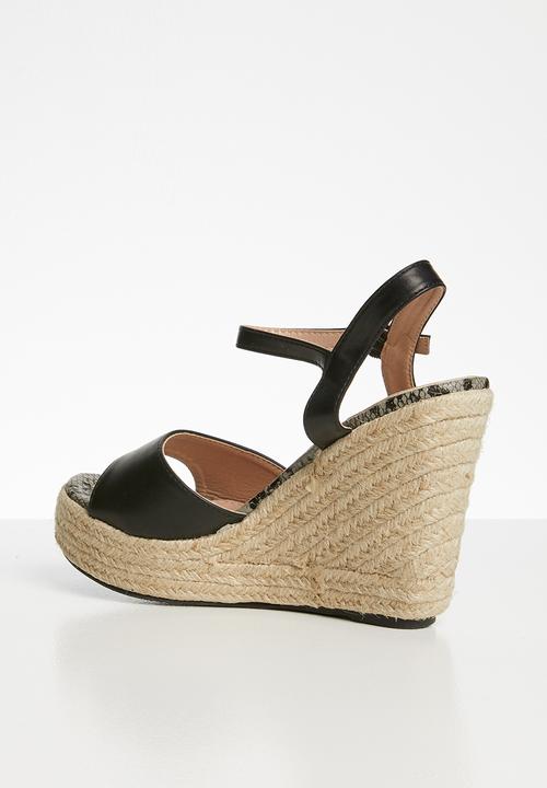 Miss Black - Faux leather wedge heel - black