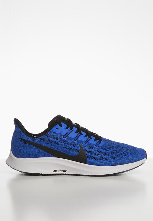 blue black and white nike shoes