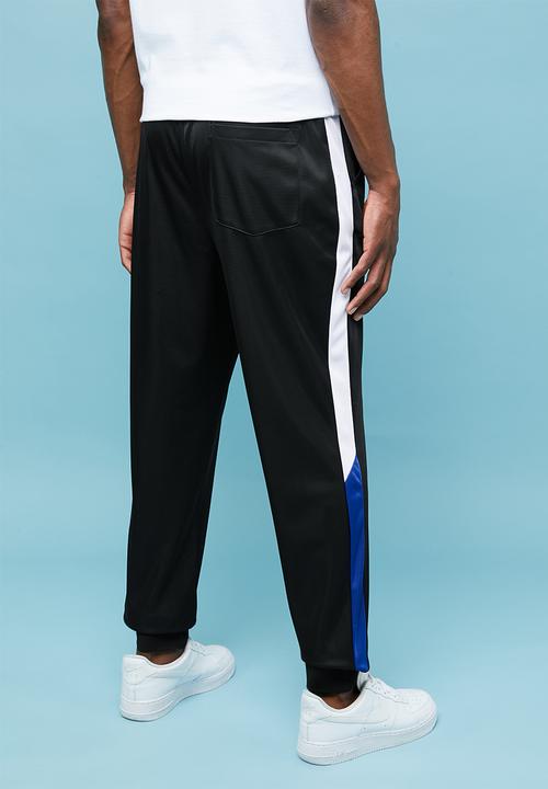 Superbalist - Slim side stripe tricot pants - black