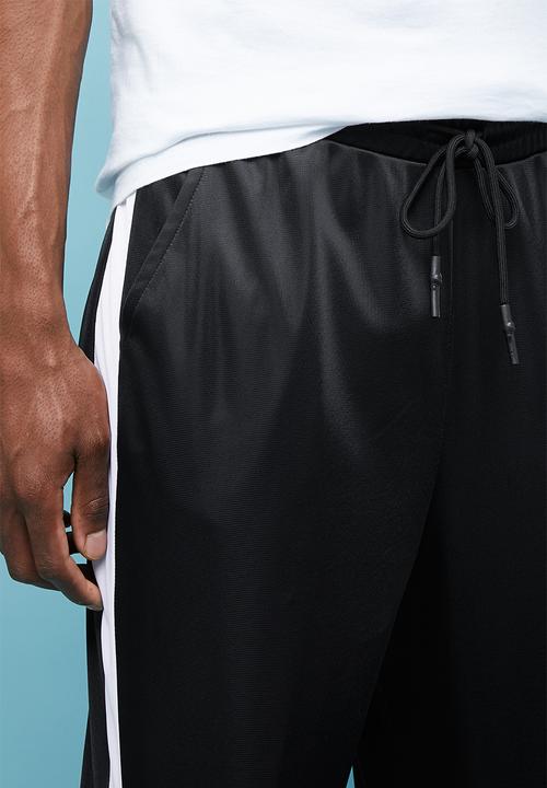 Superbalist - Slim side stripe tricot pants - black