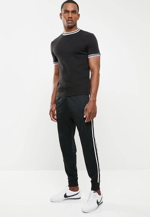 Nike - Nike sportswear jogger tribute - black & white