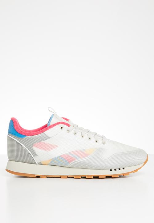 pink and white reebok classics