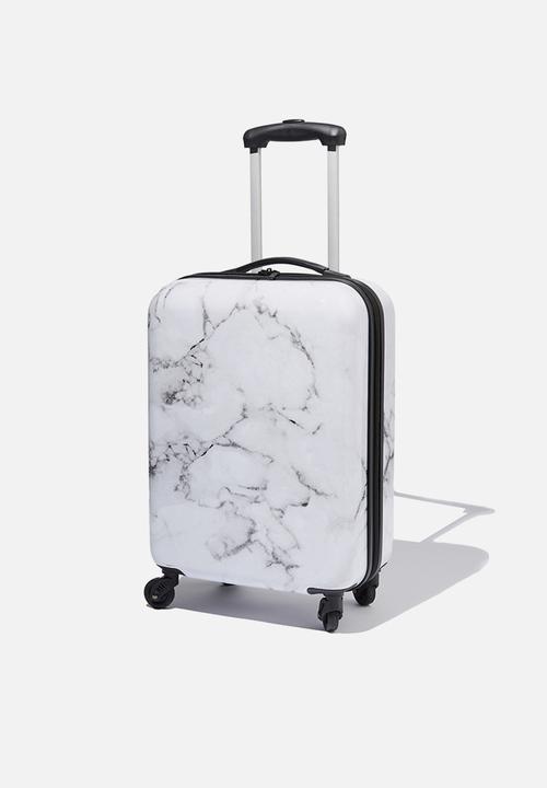 white small suitcase