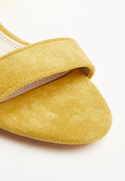 Miss Black - Herrera heel - yellow
