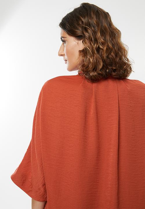 edit - Grown on sleeve shirt - rust