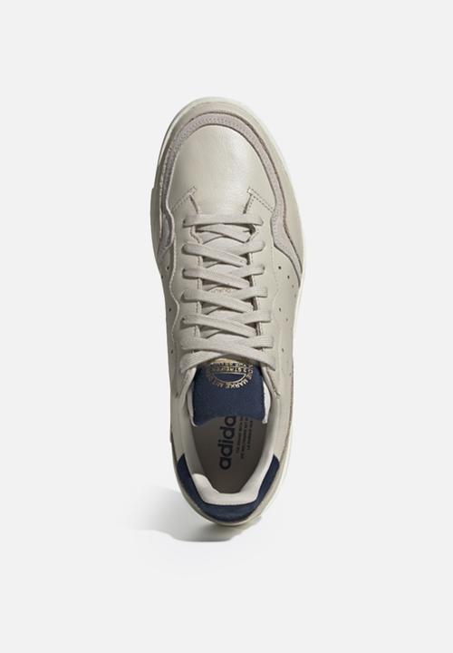 adidas Originals - Supercourt - clear brown / collegiate navy