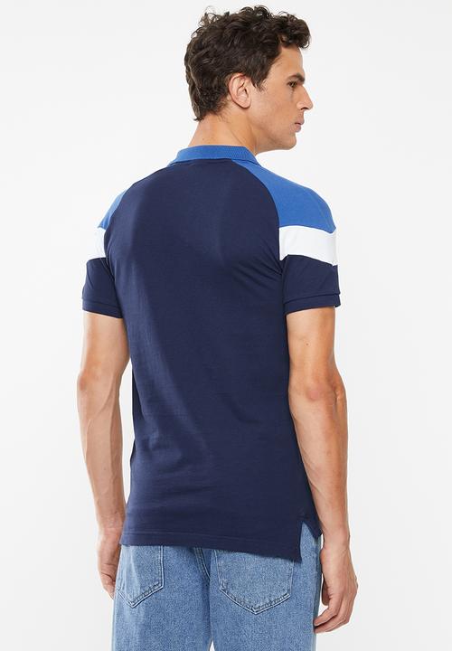 PUMA - Iconic MCS polo pique - blue & navy
