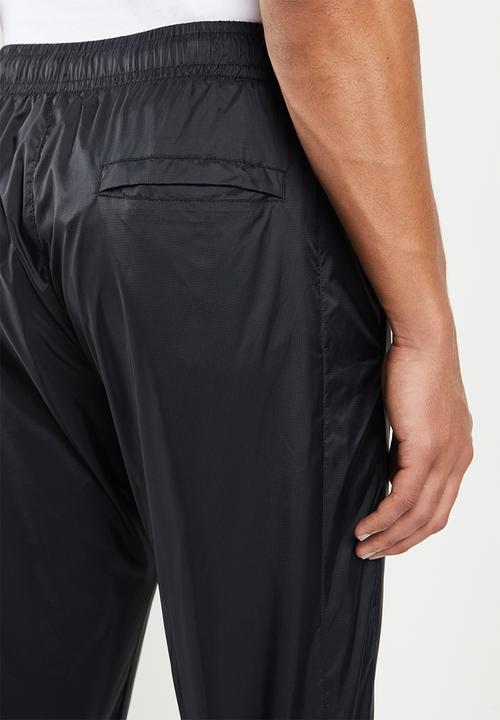 Nike - Core woven track pants - black