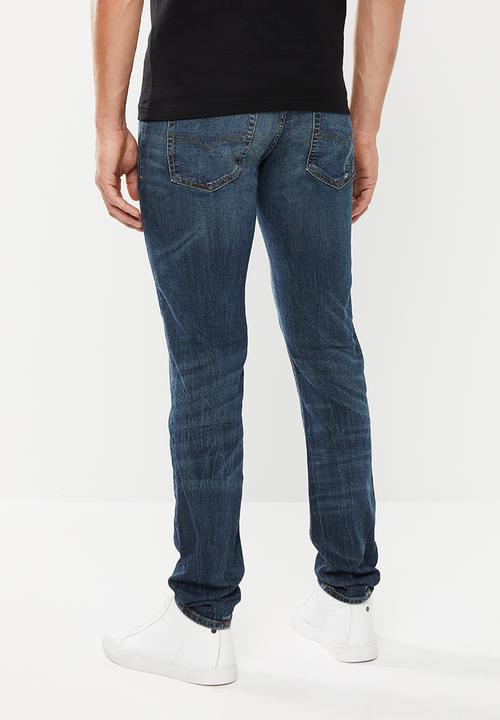 Diesel  - Sleenker-x 5 pocket skinny jeans - blue