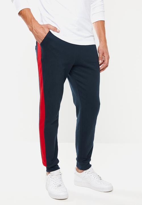 Superbalist - Skinny side stripe sweatpants - navy & red 