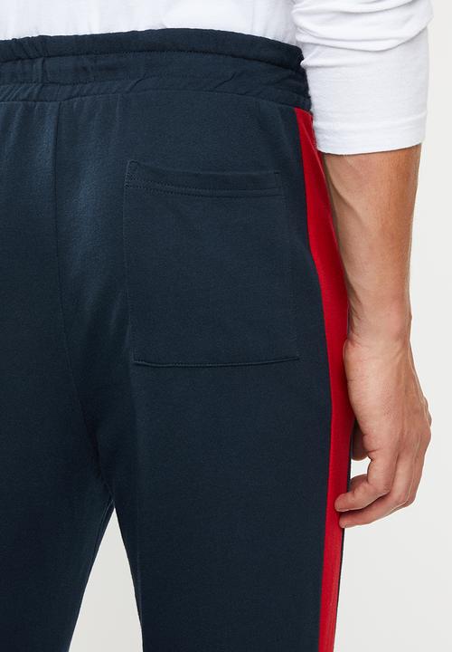 Superbalist - Skinny side stripe sweatpants - navy & red 