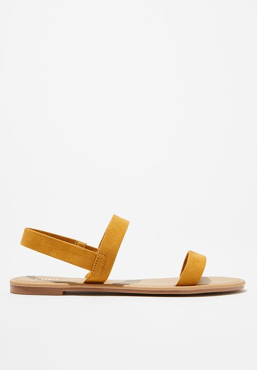 mustard yellow flip flops