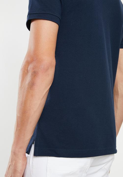 Levi’s® - Embroidered wrench stripe polo - navy