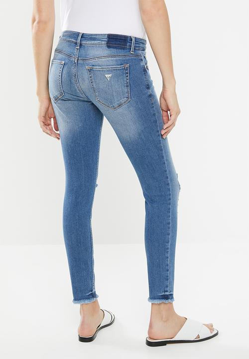 GUESS - Skinny jeans with abrasions - blue