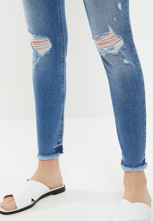 GUESS - Skinny jeans with abrasions - blue