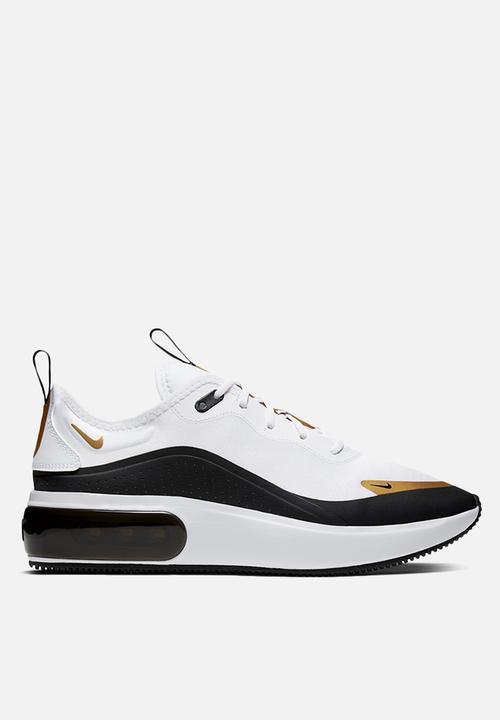 white black and gold nike shoes