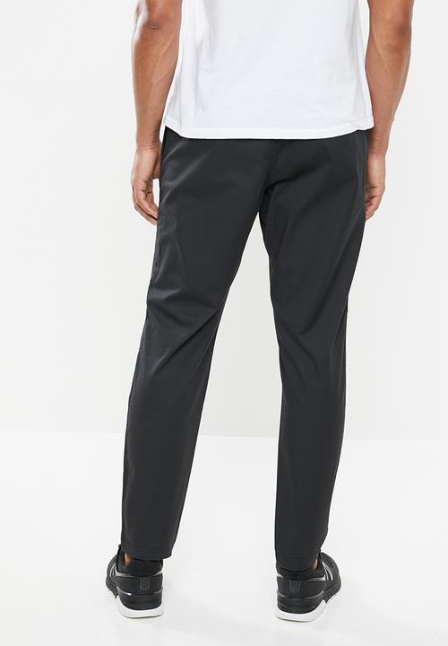 New Balance  - New Balance  athletics woven pant - black 