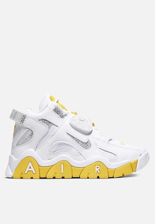 yellow and white nike sneakers