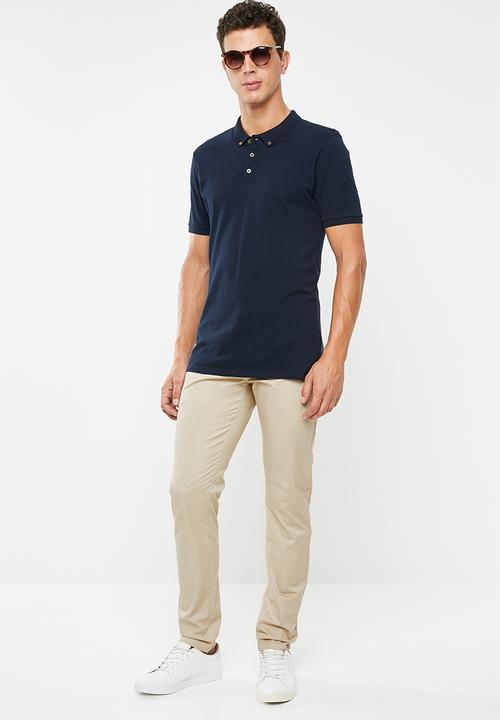 GUESS - Fashion chino pants - beige 
