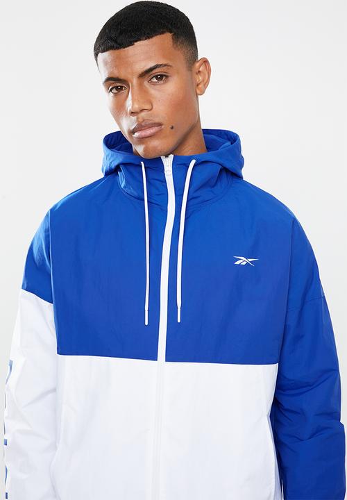 Reebok - Training essentials linear logo windbreaker - blue & white