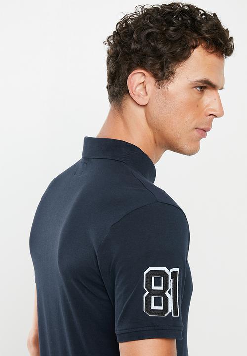 GUESS - Triangle chest print polo - navy